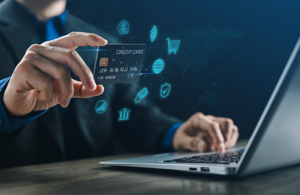 Businessman using credit card for online payment